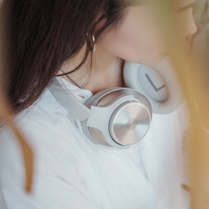 Black wireless over-ear headphones with Bluetooth and hybrid active noise cancellation, featuring memory foam earcups and USB