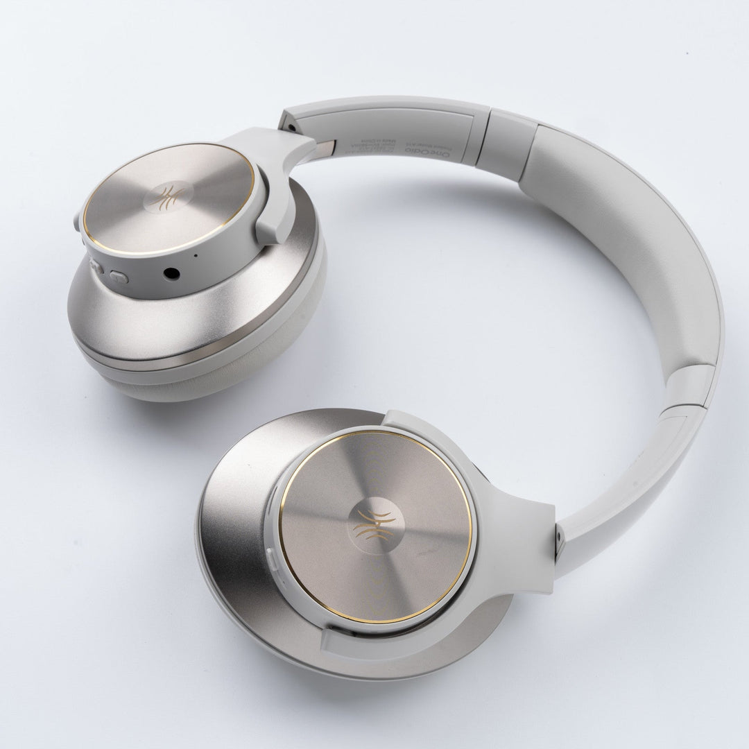 Black wireless over-ear headphones with Bluetooth and hybrid active noise cancellation, featuring memory foam earcups and USB