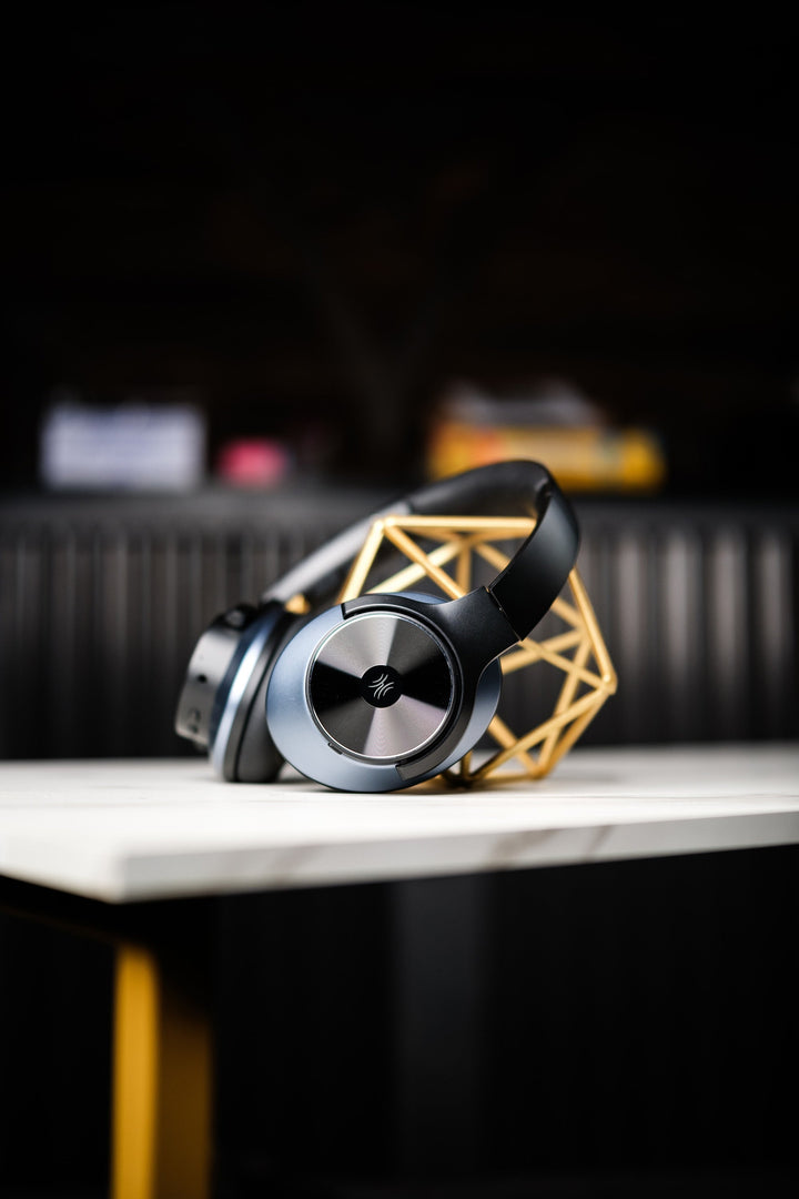 Black wireless over-ear headphones with Bluetooth and hybrid active noise cancellation, featuring memory foam earcups and USB