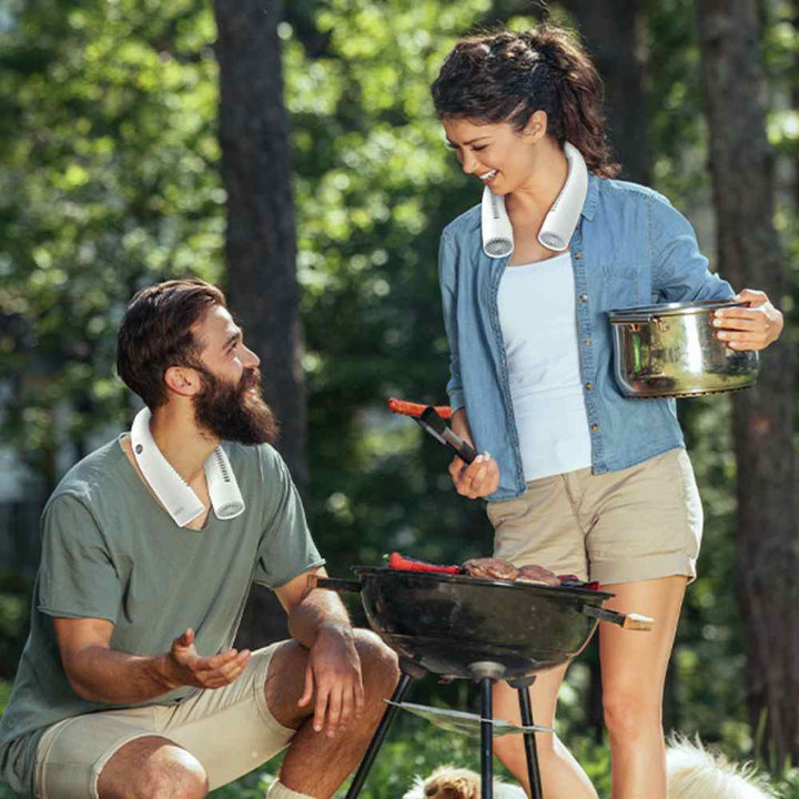 Bladeless portable neck fan, light blue and white, hands-free silent cooling with sleek design and built-in lights.