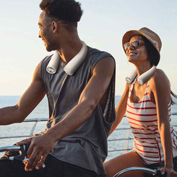 Bladeless portable neck fan, light blue and white, hands-free silent cooling with sleek design and built-in lights.