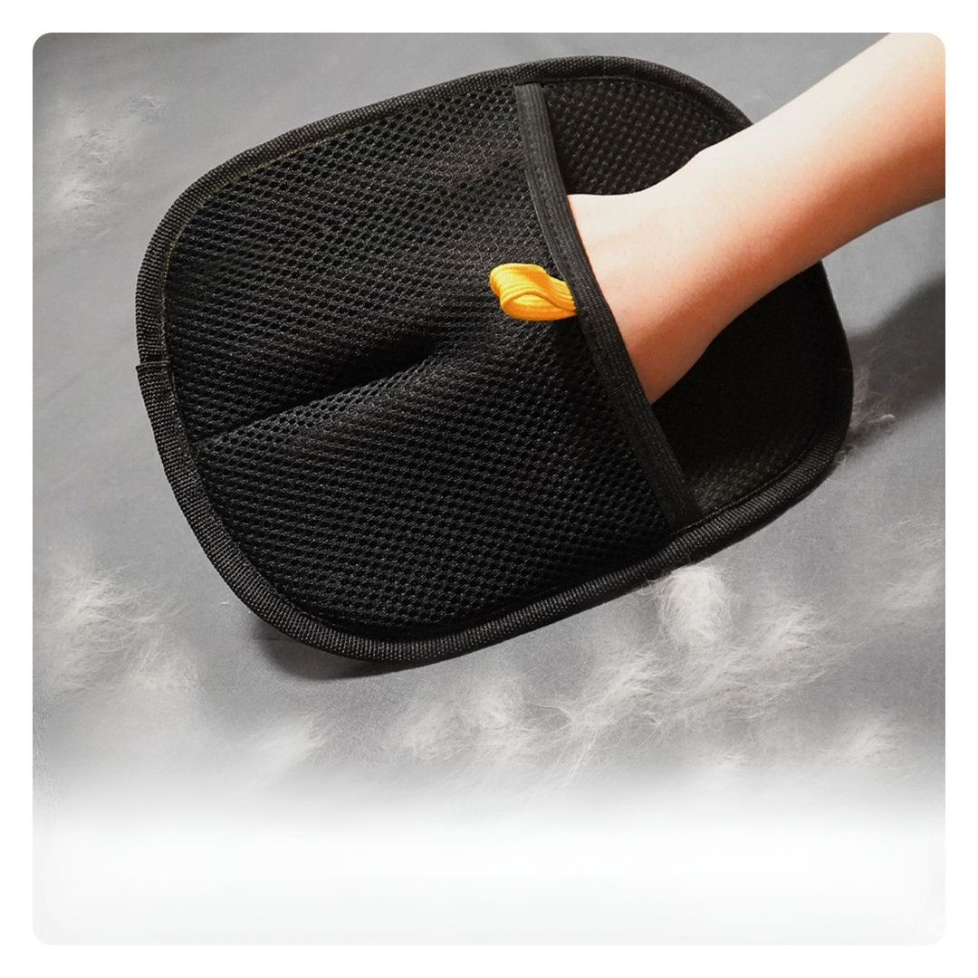"Blue pet hair removal glove on a hand, designed for easy cleaning, suitable for men and women, eco-friendly, reusable."