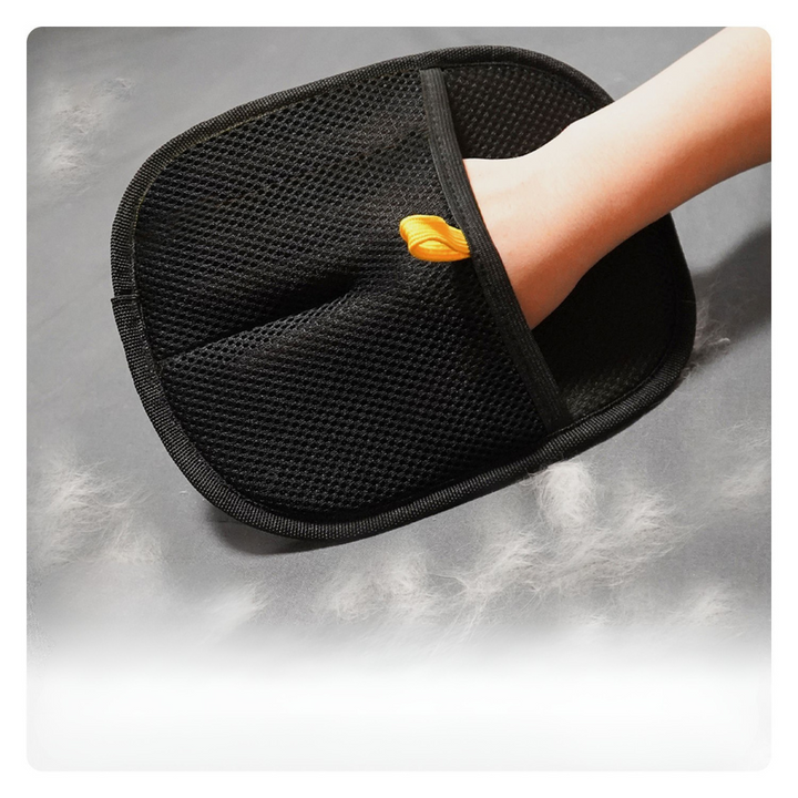 "Blue pet hair removal glove on a hand, designed for easy cleaning, suitable for men and women, eco-friendly, reusable."
