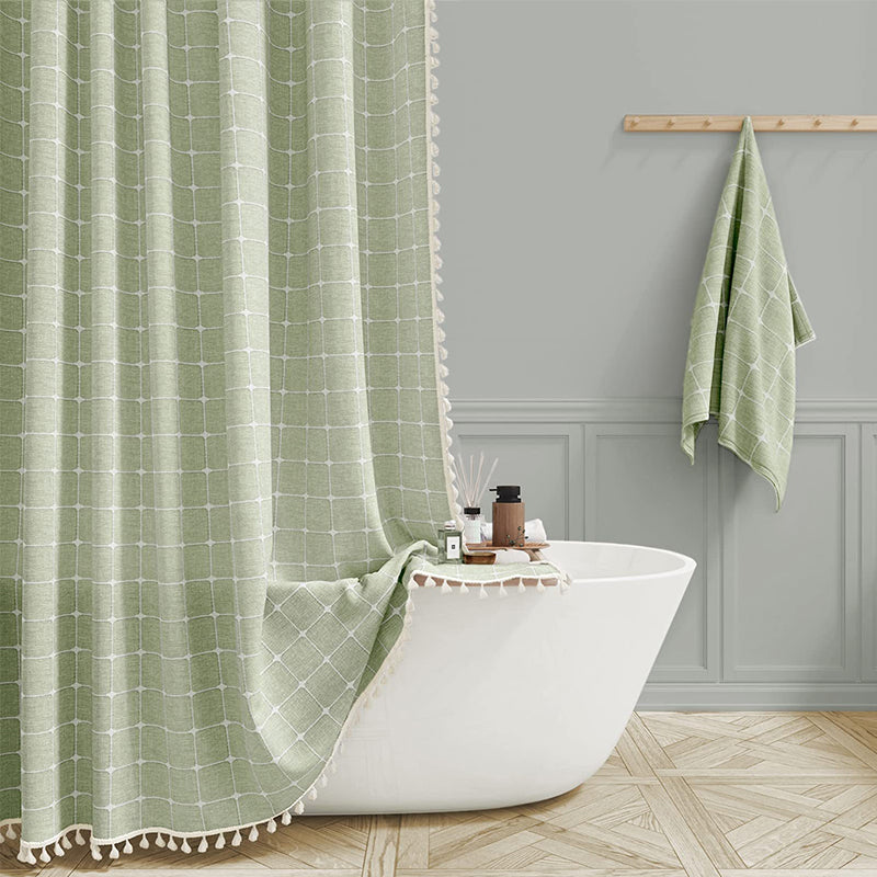"Bohemian farmhouse waterproof linen shower curtain with decorative tassels, shown in a warm beige plaid pattern."