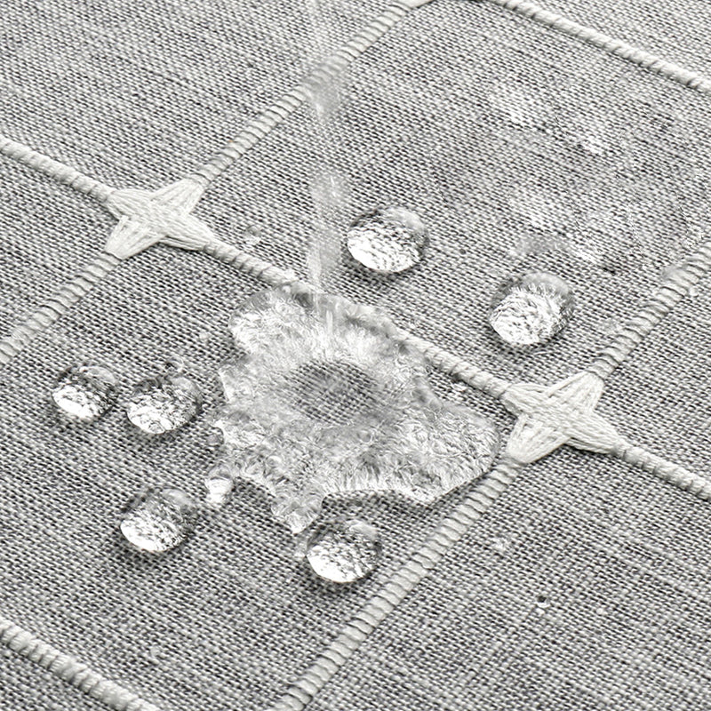 "Bohemian farmhouse waterproof linen shower curtain with decorative tassels, shown in a warm beige plaid pattern."
