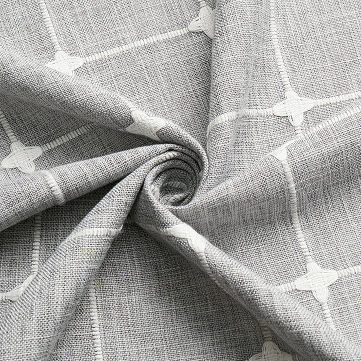 "Bohemian farmhouse waterproof linen shower curtain with decorative tassels, shown in a warm beige plaid pattern."