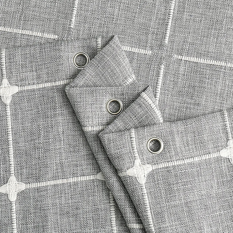 "Bohemian farmhouse waterproof linen shower curtain with decorative tassels, shown in a warm beige plaid pattern."