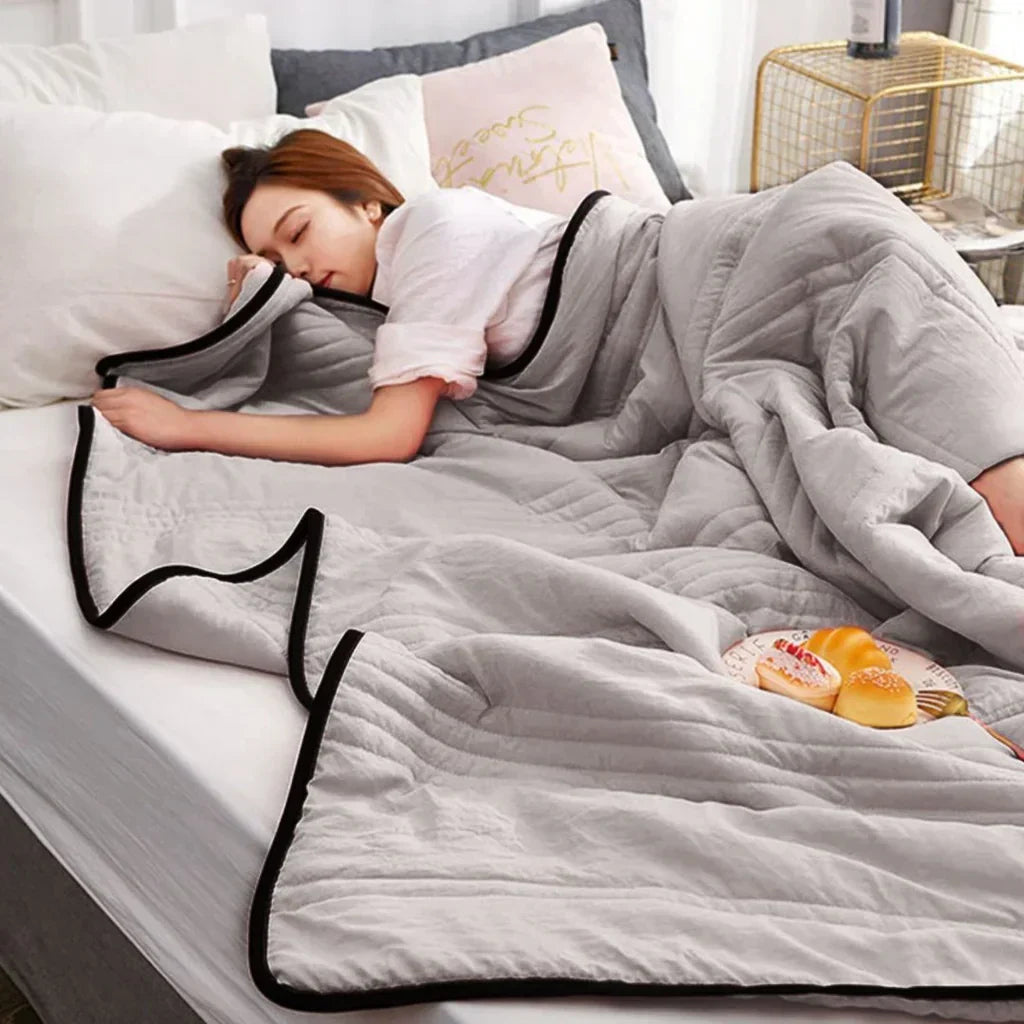 Breathable summer cooling blanket, a lightweight bamboo blend throw for heat relief & comfortable sleep.