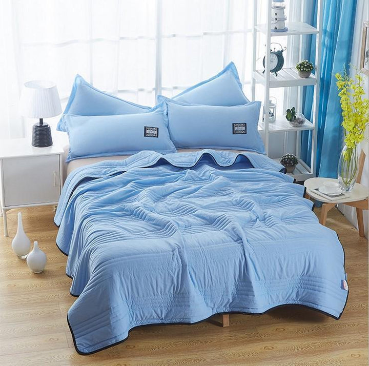 Lightweight cooling blanket, perfect for summer heat relief & comfortable, breathable sleep.
