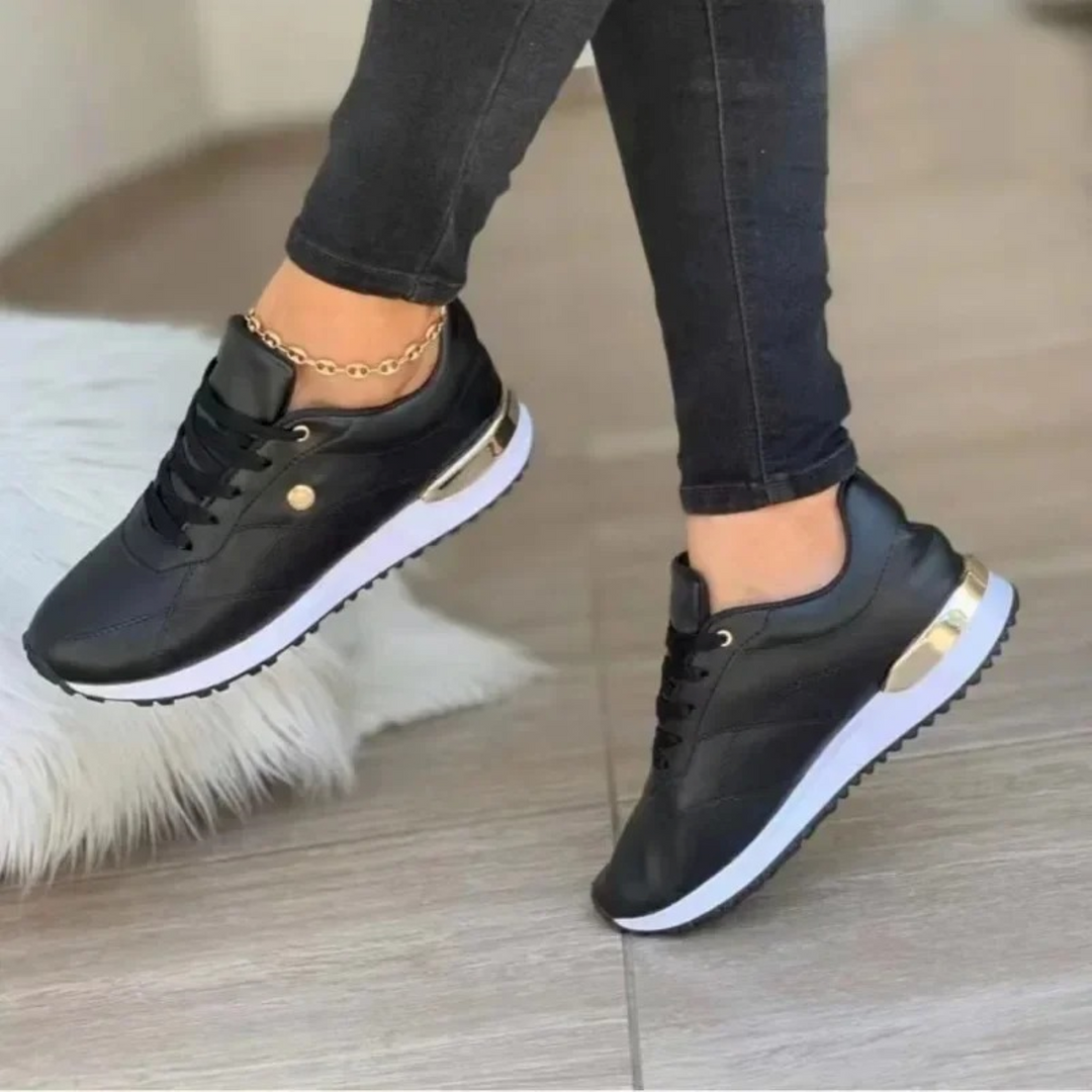 Stylish Celia leather fashion sneakers for women. Comfortable everyday footwear, versatile for casual chic outfits.