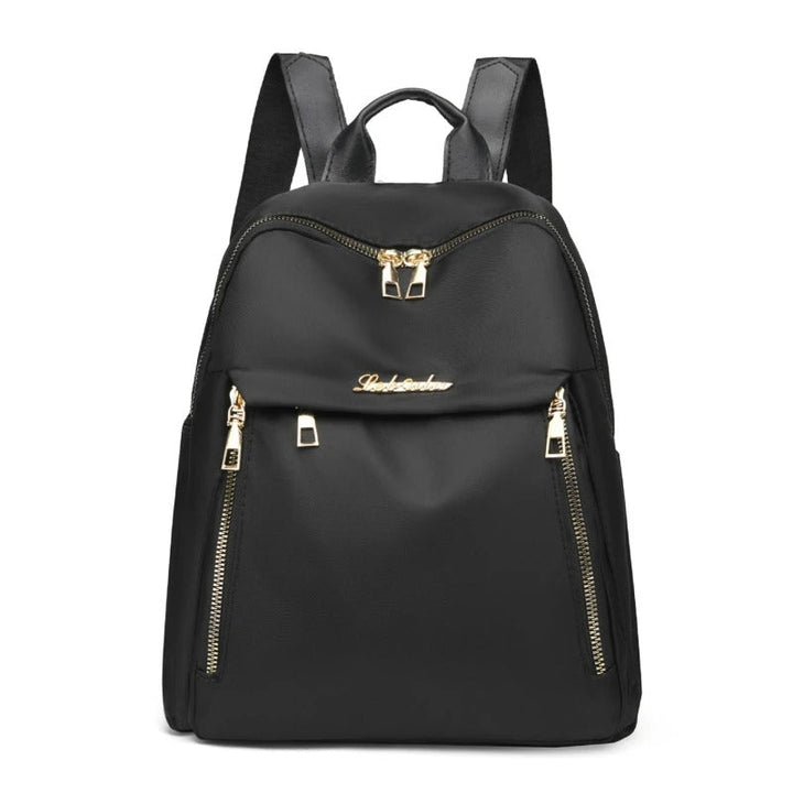Chic black PU leather travel backpack for women, stylish and durable for daily commutes or weekend trips.