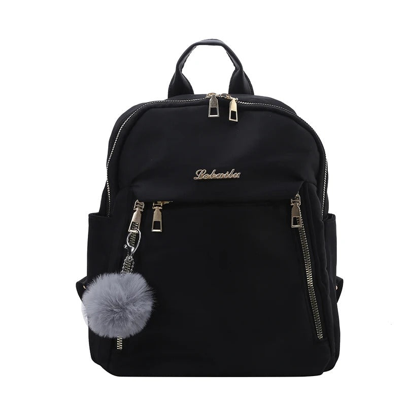 Stylish women's black PU leather backpack, ideal for daily use, work, and school with ample storage.