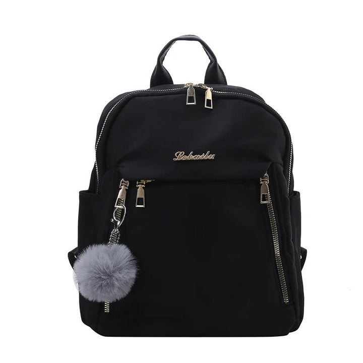 Stylish women's black PU leather backpack, ideal for daily use, work, and school with ample storage.