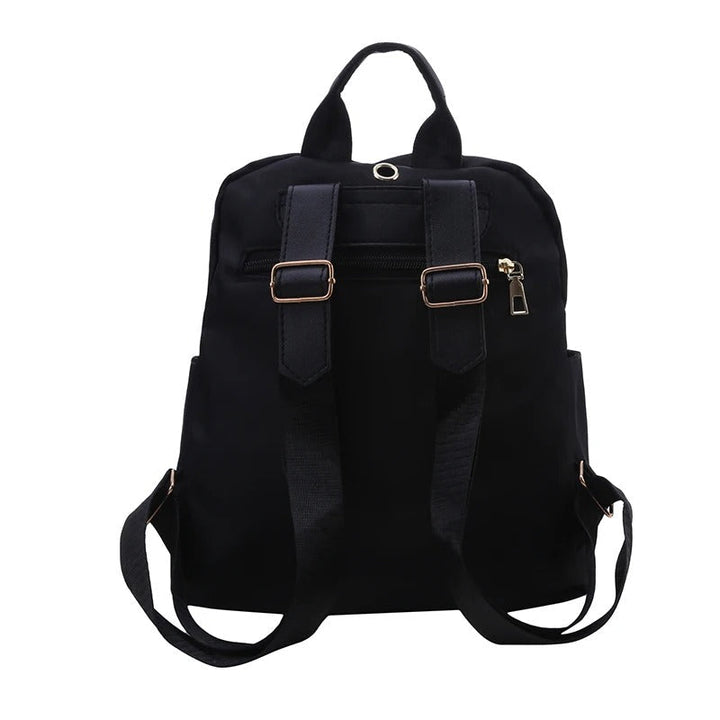 Fashionable PU leather travel backpack for women, elegant design, suitable for business and casual outings.