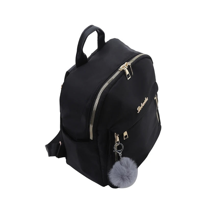 Durable women's PU leather daily backpack, sleek black finish, great for students and professionals.
