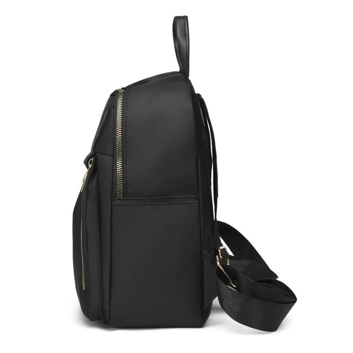 Elegant black PU leather women's backpack, multi-functional for travel, work, and everyday essentials.