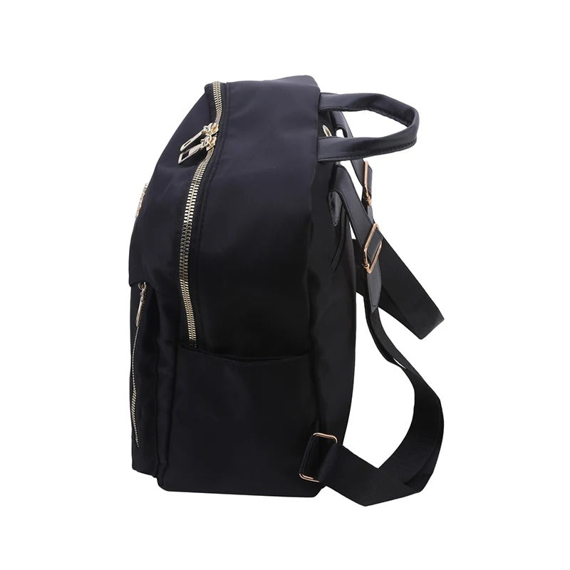 Organizational women's travel backpack in chic PU leather, perfect for daily carry & weekend adventures.