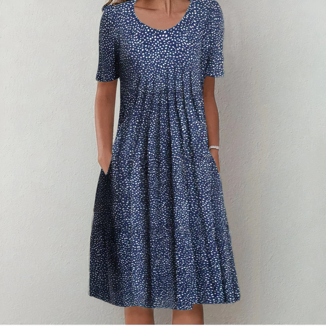 Flowy casual summer midi dress for women, versatile & stylish for warm weather. Effortless comfort.