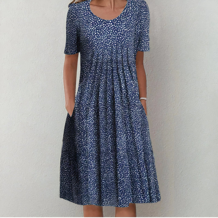 Flowy casual summer midi dress for women, versatile & stylish for warm weather. Effortless comfort.