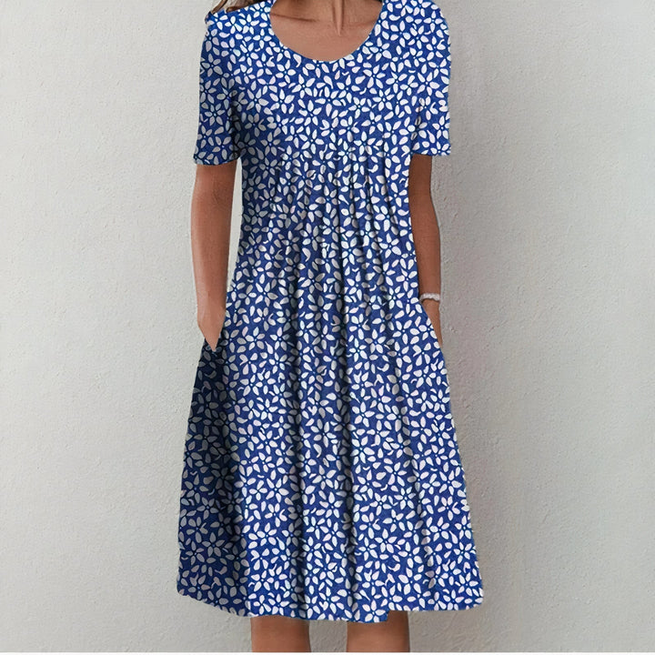 Stylish Lina cotton midi dress, colorful & chic women's apparel. Elegant and comfortable for summer.