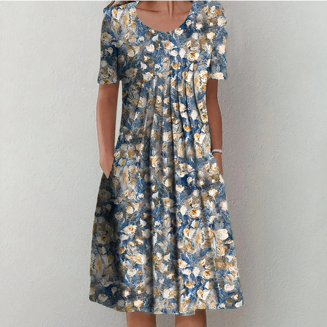 Women's chic summer midi dress, soft cotton, flowy and versatile for elegant warm weather fashion.