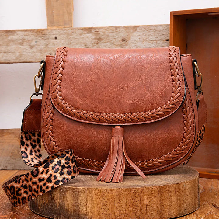 Chic faux leather small shoulder bag for women, an elegant fashion accessory.