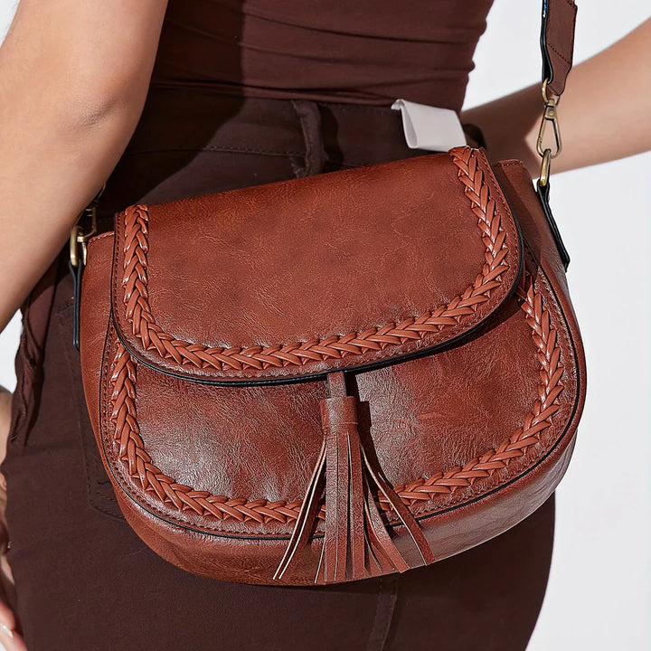 Stylish women's small faux leather shoulder bag, a chic and practical accessory.