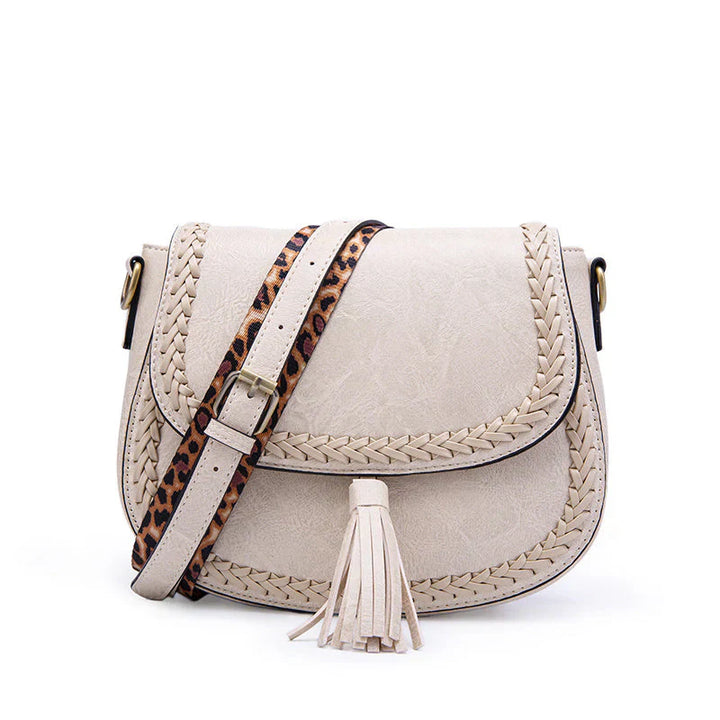 Fashionable women's small shoulder bag, elegant faux leather with cross-body versatility.