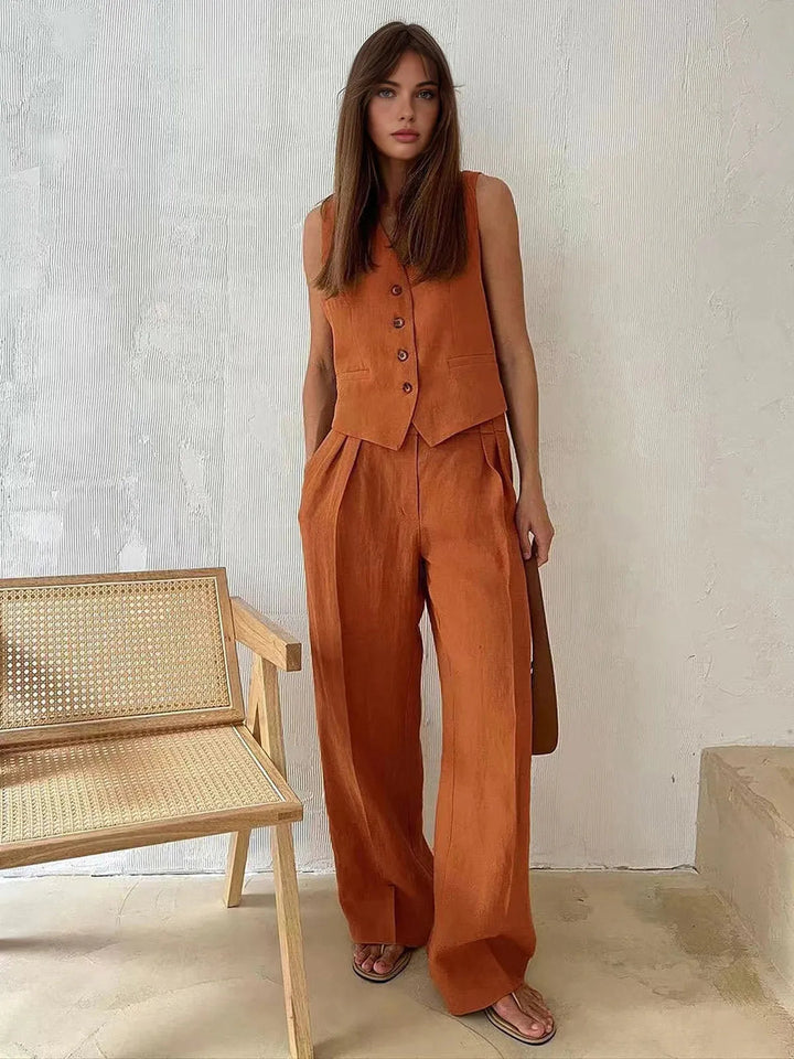 Comfortable linen blend two-piece set for women. Stylish waistcoat and wide-leg trousers, perfect casual wear.