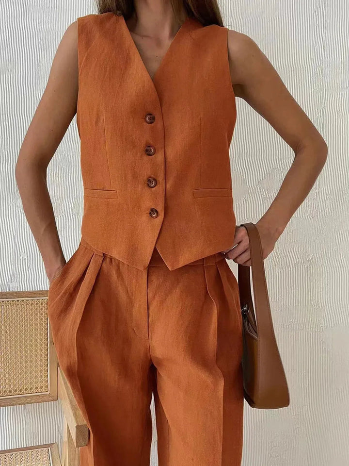 Women's chic two-piece set: cotton linen waistcoat and wide-leg trousers. Perfect for a comfortable summer look.