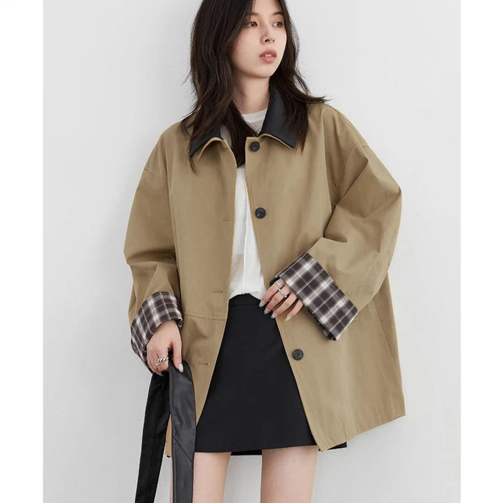 Stylish women's dark beige button-up outerwear jacket with contrast trim, ideal as a chic layering piece for fall.