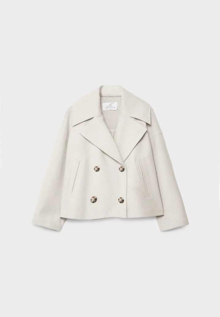 Sophisticated women's double-breasted short coat, elegant tailored jacket outerwear.