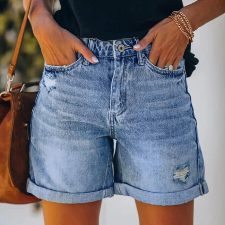 Chic women's high waist blue shorts, perfect for stylish summer fashion and comfortable casual everyday wear.