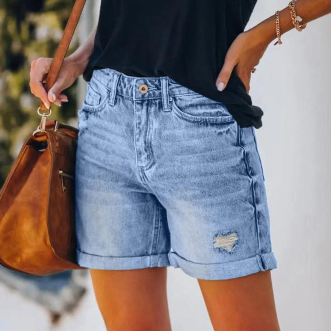 Stylish blue high waist shorts for women, featuring a comfortable fit for elegant summer fashion looks.