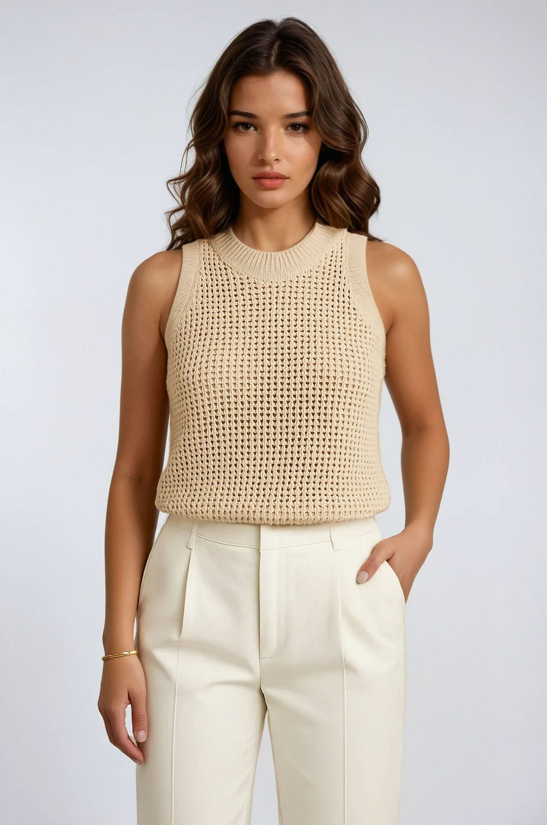 Chic women's hollow knit tank top with ribbed collar, perfect for summer casual wear and everyday style.
