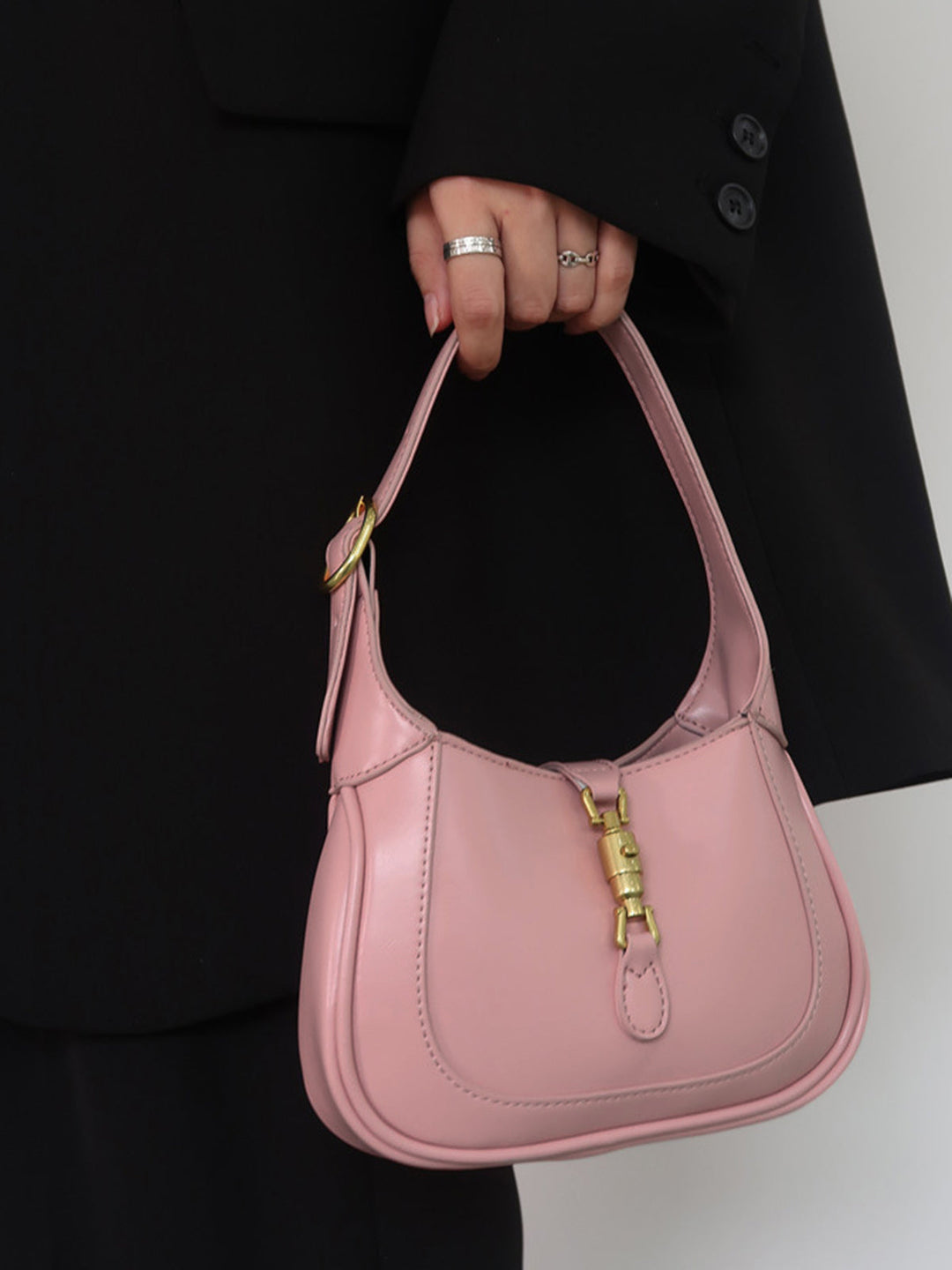 Compact women's mini shoulder bag, a chic and versatile everyday handbag accessory.
