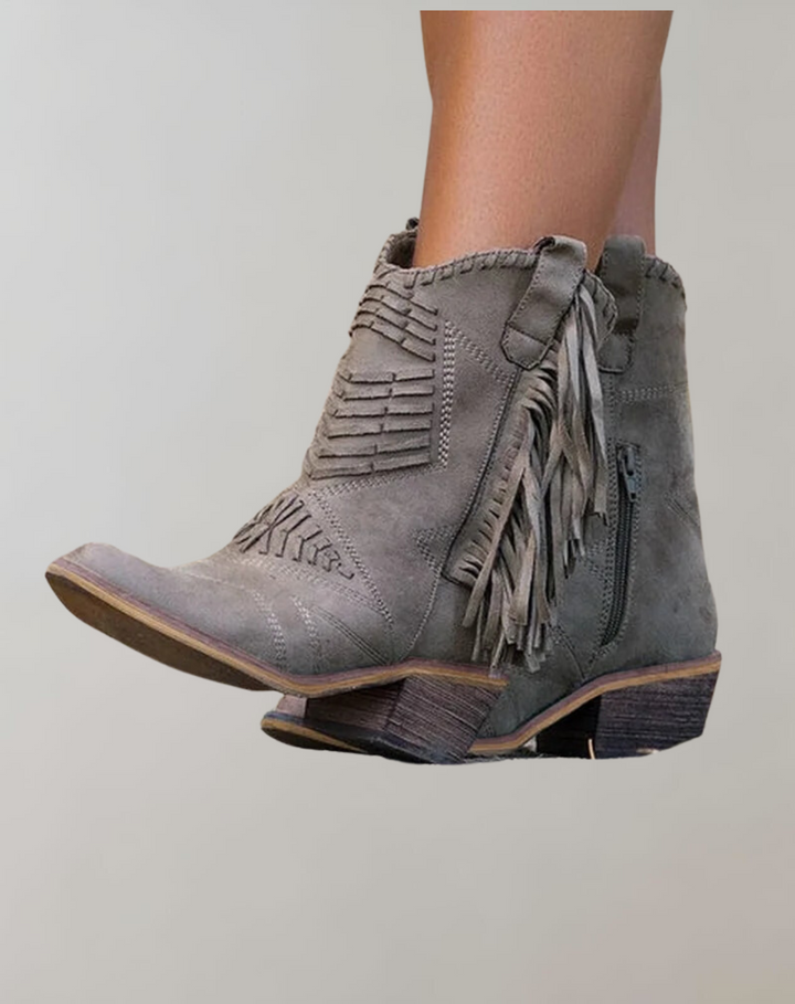 Chic women's Selena ankle boots with stylish tassels, perfect for everyday fashion & fall outfits.