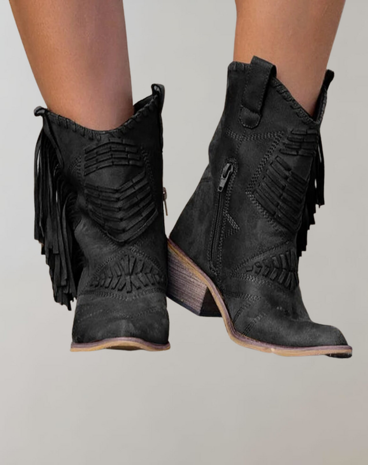 Fashionable women's tassel ankle boots, offering chic style and comfort for fall and winter seasons.
