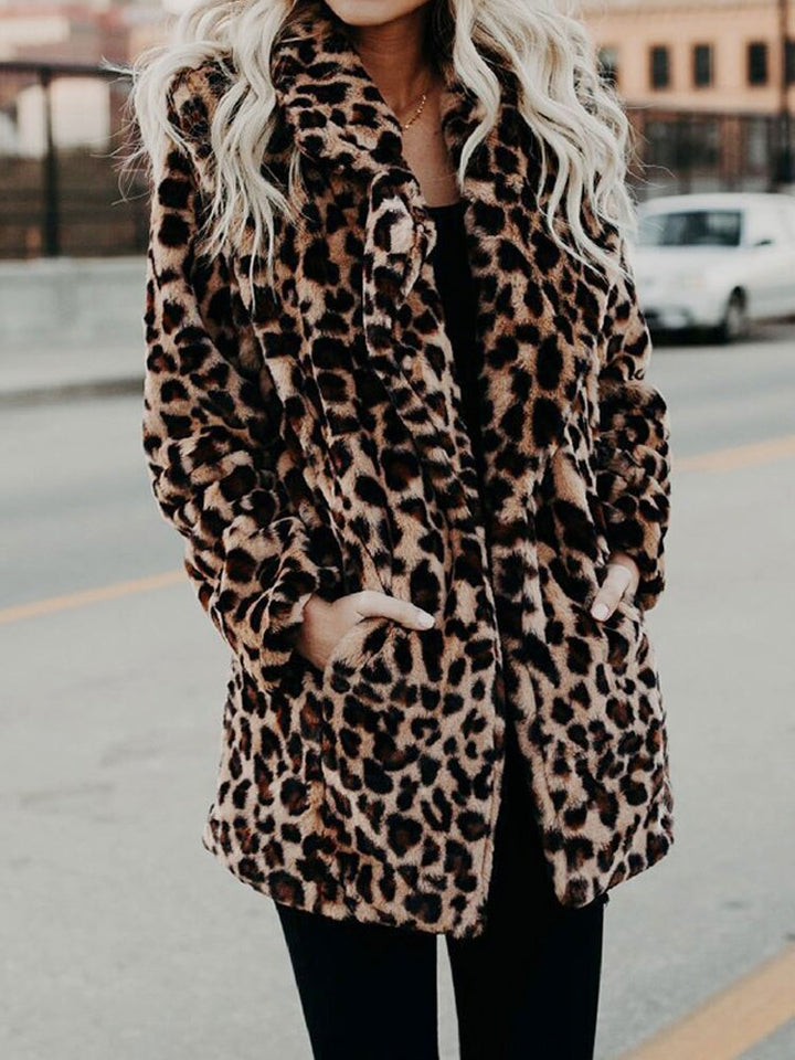Bold Sofia women's leopard print winter coat with a luxurious oversized collar, a trendy fashion statement.
