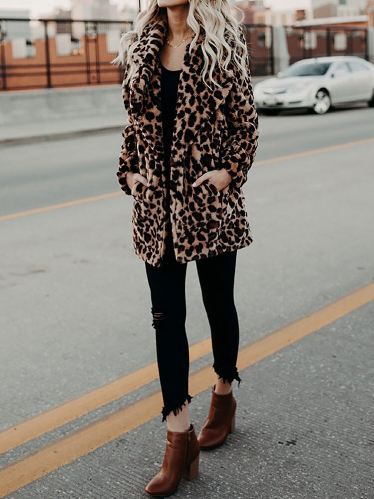 Sofia women's warm leopard print winter coat. Chic outerwear with an oversized collar for a fashion-forward look.