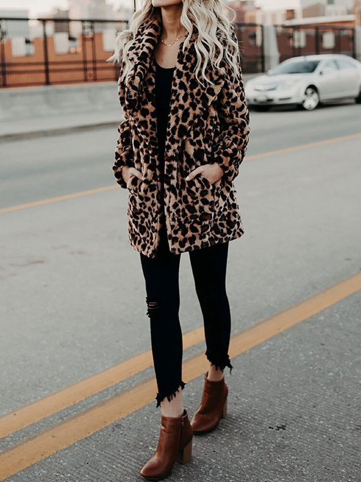 Sofia women's warm leopard print winter coat. Chic outerwear with an oversized collar for a fashion-forward look.