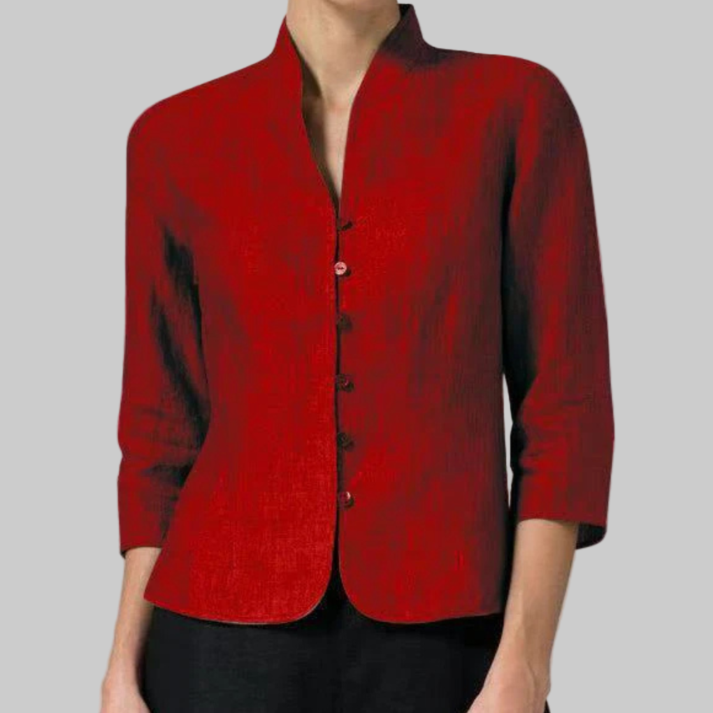 Versatile women's stand-collar blouse. Elegant top with chic details, ideal for dressy occasions or smart casual wear.