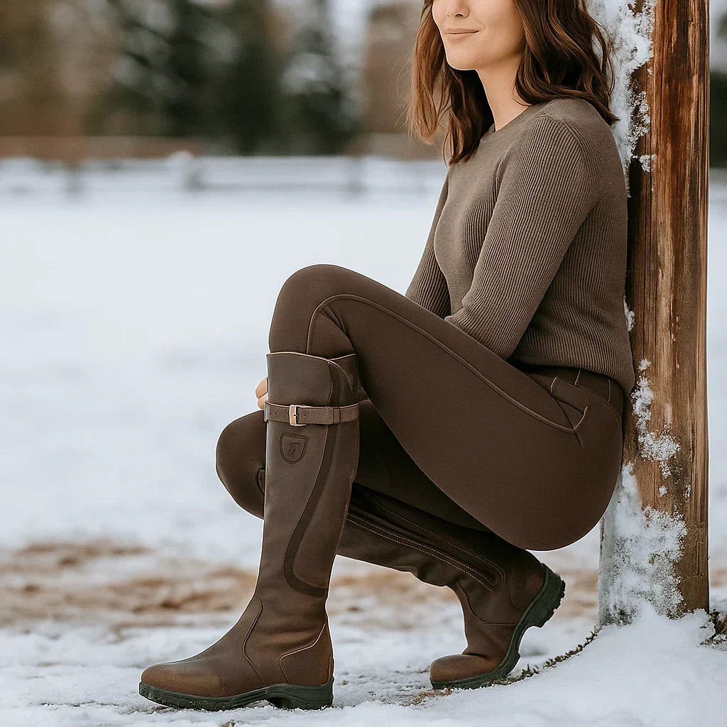 Chic women's supportive everyday boots in black leather, perfect for fall and winter comfort.