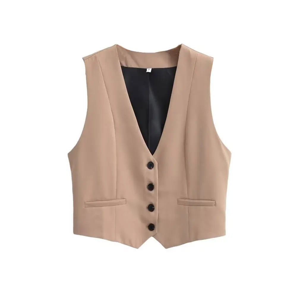 Stylish women's tailored vest paired with a white shirt, a chic layering piece for versatile office & casual fashion.