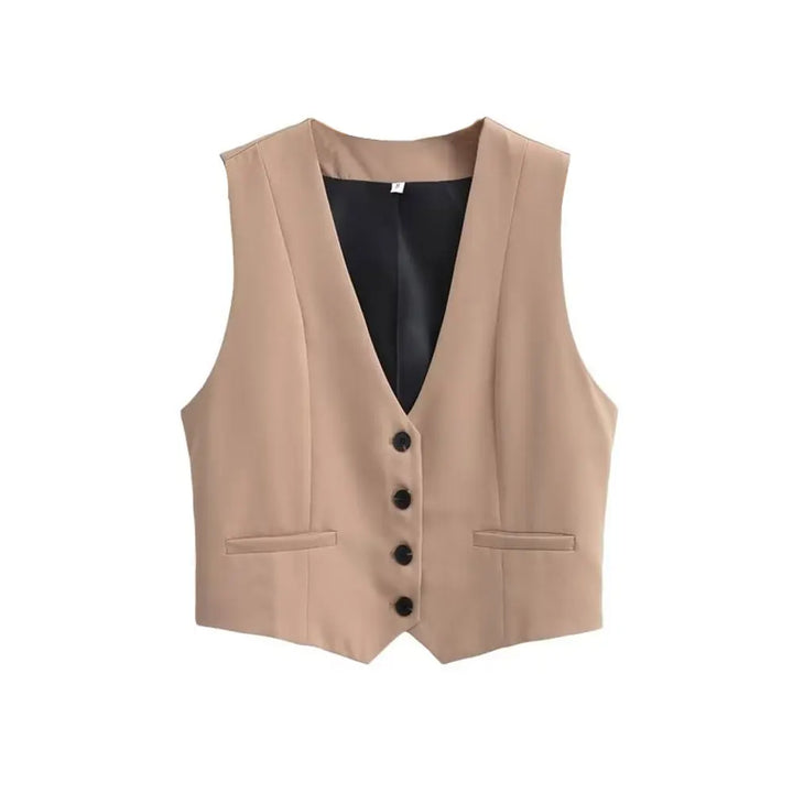 Stylish women's tailored vest paired with a white shirt, a chic layering piece for versatile office & casual fashion.