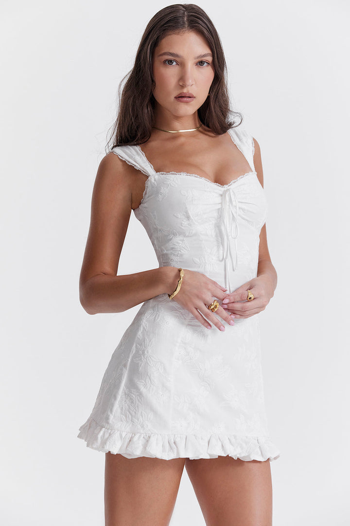 Versatile women's short white mini dress with a tie waist, suitable for summer parties, casual days, or resort wear.
