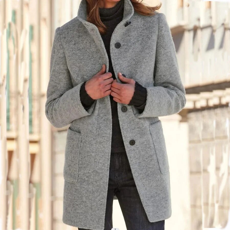 Chic women's winter overcoat, long & warm, perfect for stylish cold weather outerwear. Features classic button front.