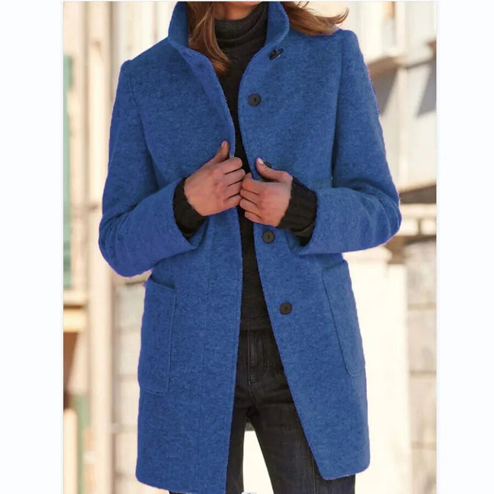 Stylish Emma women's long winter coat with standing collar. Versatile chic outerwear for cold weather fashion.