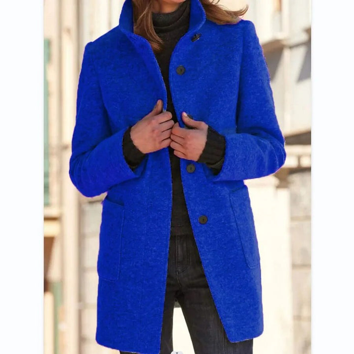 Warm & stylish women's long overcoat for winter. Chic classic fashion outerwear with button detailing for cold weather.