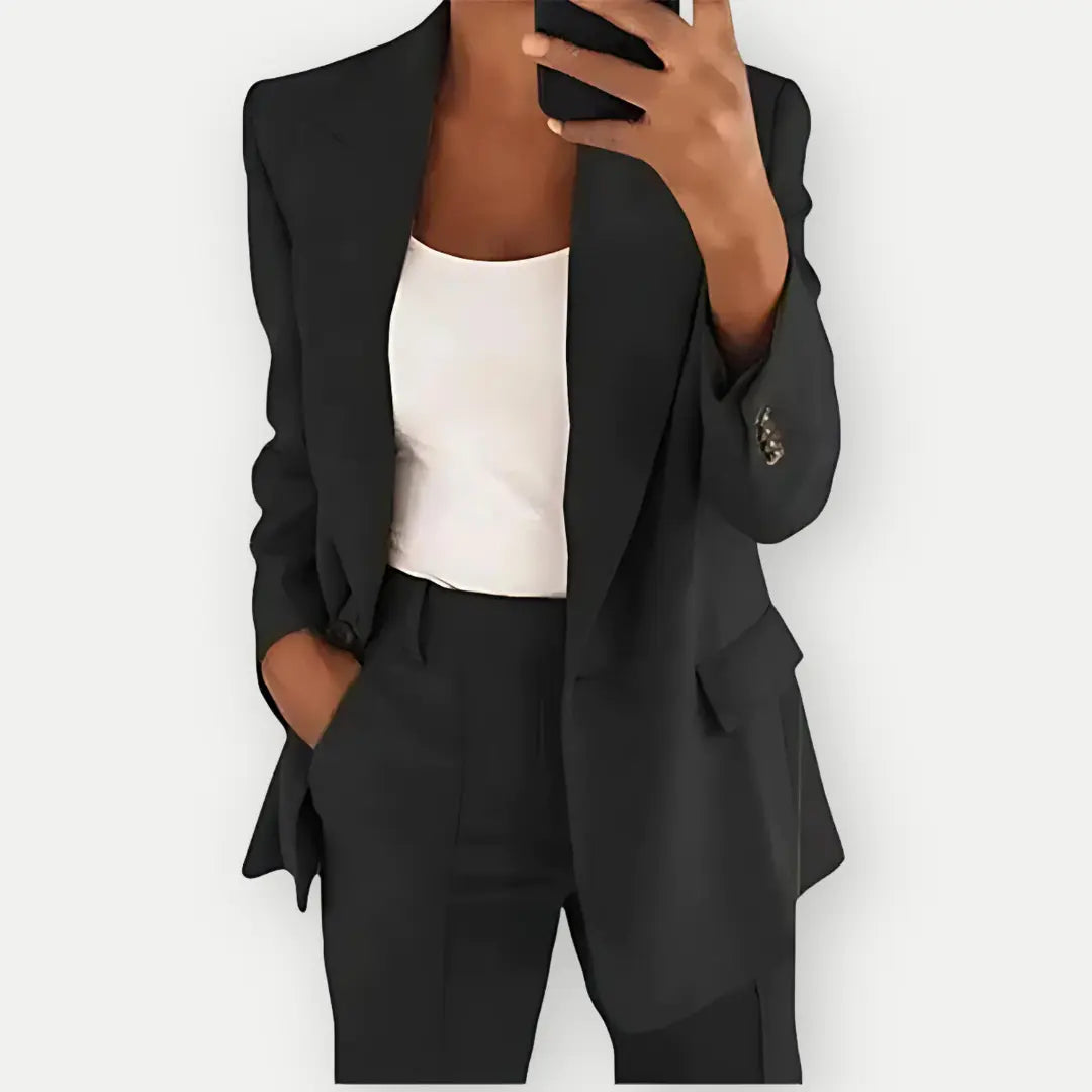 Chic women's tailored blazer and trouser set, elegant business attire with a modern fit, ideal for office or formal events.
